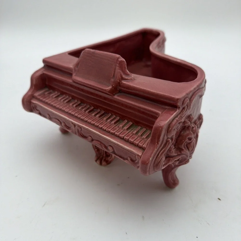 vintage ceramic baby grand piano planter in a dusty rose